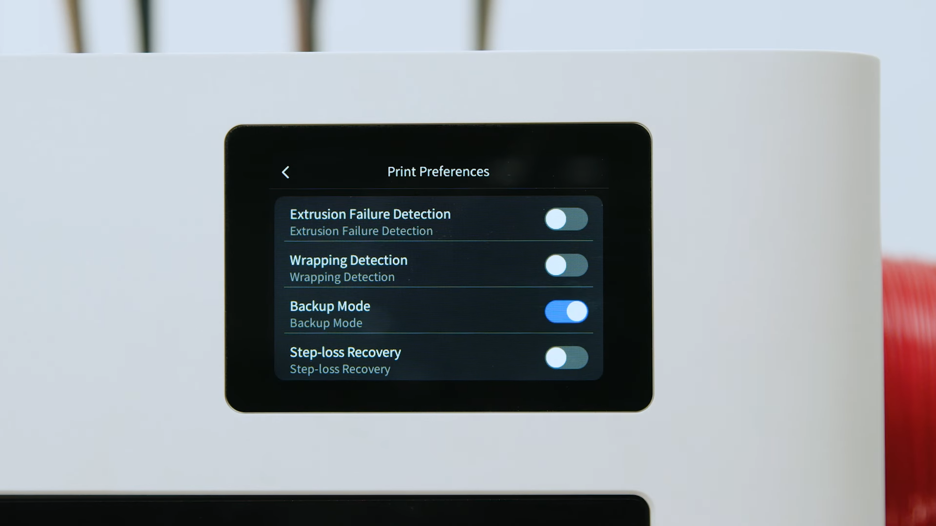 Close-up of a 3D printer's touchscreen interface showing the 'Print Preferences' menu with the 'Backup Mode' toggle active for advanced spool management.